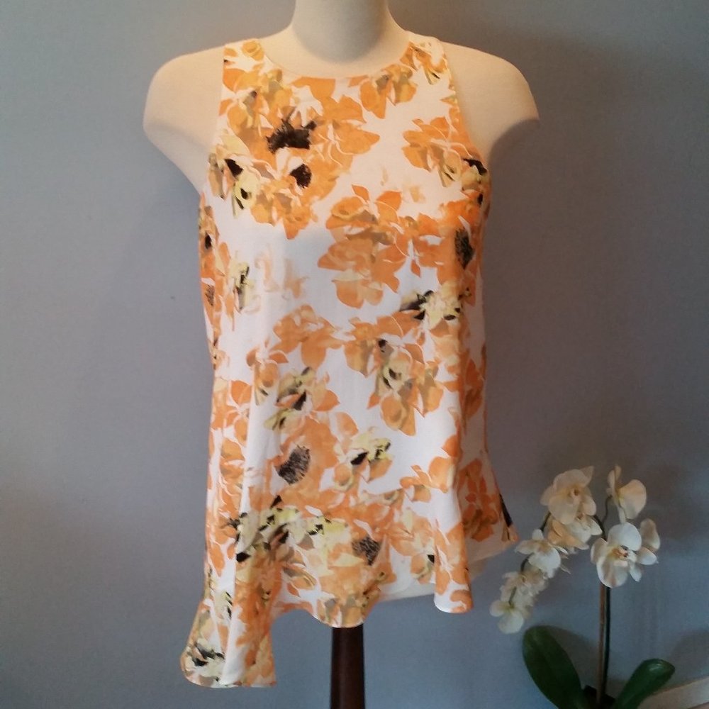 DKNYC short sleeved asymetrical floral blouse